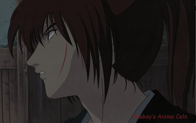 Kenshin peeks carefully around the darkened back fence of the inn.