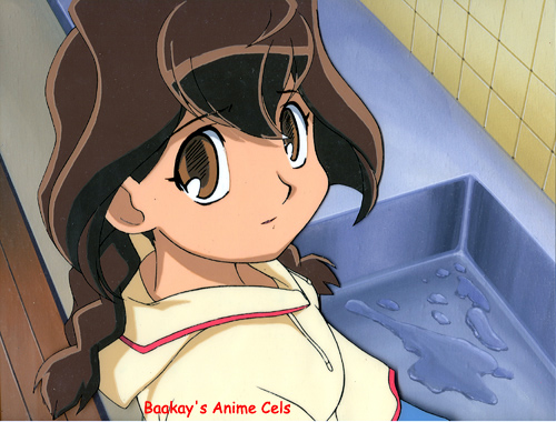 Jubei-chan in front of the sink, doing the dishes.